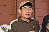 Comedian Lee Kyung-kyu speaks to reporters at Seoul Gangnam Police Station in southern Seoul on June 24. [NEWS1]