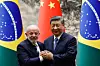 Chinese President Xi Jinping, right, shakes hands with Brazil's President Luiz Inacio Lula da Silva after a signing ceremony and a joint press conference, at the Great Hall of the People in Beijing on May 13. [AFP/YONHAP]