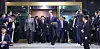 Former Prime Minister Han Duck-soo, center, walks out of the central government complex in Jongno District in Seoul on May 1, after announcing his resignation. [JOINT PRESS CORPS]