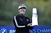 Hannah Green of Australia holds the winning trophy during the awards ceremony after winning the BMW Ladies Championship golf tournament at Seowon Valley Country Club in Paju, Gyeonggi on Sunday. [AP/YONHAP]