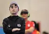 Kim Ye-ji waits during the women's 10-meter air pistol gold medal match at Chateauroux in France on Sunday. [JOINT PRESS CORPS]