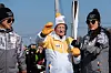 Charland when he revisited in 2018 carrying a torch in a relay for the PyeongChang Olympics in Gangwon. [CLAUDE CHARLAND]