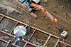 A construction worker works under a sunshade at a site in Daegu on Aug. 5. [YONHAP]