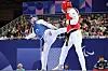 Joo Jeong-hun, left, kicks Nurlan Dombayev of Kazakhstan during the men’s K44 -80 kilogram taekwondo bronze medal match at the 2024 Paris Paralympic Games on Saturday in Paris. [YONHAP]