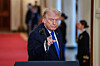 U.S. President Donald Trump gestures at the end of an event to honor ″Angel Families″ who have lost family members to crimes committed by people in the country illegally, at the White House in Washington on Feb. 23. [REUTERS/YONHAP]