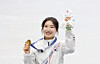 Kim Gil-li of Korea celebrates on the podium after winning the gold medal in the women's 1,500-meter short track speed skating event at the Winter Olympics at Milano Ice Skating Arena in Milan on Feb. 20. [YONHAP]