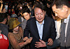 Former President Yoon Suk Yeol leaves the theater after a screening of the documentary film ″Election Fraud: A Work of God?″ at Megabox Dongdaemun in Seoul on May 21. [JOONGANG ILBO]