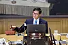 Bank of Korea (BOK) Gov. Rhee Chang-yong bangs the gavel to open a Monetary Policy Committee meeting at the central bank in Jung District, central Seoul, on April 17. [JOINT PRESS CORPS]