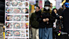 Restaurant menus are displayed on a street in Myeong-dong, central Seoul, on March 16. [NEWS1]