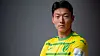 Hwang Ui-jo poses in a Norwich City shirt in a photo released by the club on Friday. [NORWICH CITY]