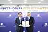 Seoul National University President Ryu Hong-lim, left, poses for a photo with Cosmax Chairman Lee Kyung-soo after signing a memorandum of understanding to continue cosmetics technology research. [SEOUL NATIONAL UNIVERSITY]
