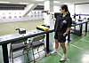 The Korea JoongAng Daily's Mary Yang attempts to have a main character moment by training like Korean sport shooter Kim Ye-ji during a session at the Mokdong Fire Range in southern Seoul on Aug. 13. [PARK SANG-MOON]