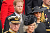 Britain's King Charles III, from bottom left, Camilla, the Queen Consort, Prince Harry and Meghan, Duchess of Sussex watch as the coffin of Queen Elizabeth II is placed into the hearse following the state funeral service in Westminster Abbey in central London Monday Sept. 19, 2022. [AP/YONHAP]
