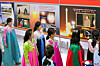 Visitors browse photos during an exhibition marking the 80th anniversary of the Korean Peninsula's liberation from Japan's 1910-45 colonial rule in this photo published by the Korean Central News Agency on Aug. 5. [YONHAP]