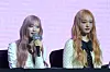 Members Leeseo, left, and Liz of girl group IVE at a press conference held on Feb. 3 at the Conrad Seoul hotel in western Seoul [KIM MYEONG-JI]