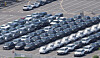 Completed Hyundai vehicles await shipment at the export pier near the company’s Ulsan plant on July 31. [YONHAP]