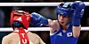 Korea's Im Ae-ji, right, throws a punch during the women's bantamweight semifinals at the Paris Olympics Sunday. [YONHAP]