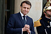 France's President Emmanuel Macron gestures as he waits for Romania's interim president for talks at the Elysee Presidential Palace in Paris on Feb. 19. [AFP/YONHAP]