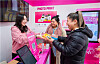 Foriegn tourists visit a welcome center and receive offline shopping coupons in Seoul during the 2024 Korea Grand Sale period which ran from Jan. 11 to Feb. 26. [YONHAP]