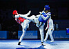 Korean Taekwondo athlete Kwak Min-ju, right, competes against an opponent during a match at the 2025 World Taekwondo Grand Prix Challenge at Hua Mak Indoor Stadium in Bangkok, Thailand, on Nov. 23, 2025. [WORLD TAEKWONDO]
