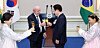 President Lee Jae Myung, center right, and Brazilian President Luiz Inacio Lula da Silva, center left, toast at the state banquet at the Blue House in central Seoul on Feb. 23, after their summit talks. They are joined by first ladies Kim Hea Kyung, far left, and Rosangela Lula da Silva, far right, wearing matching hanbok, or traditional Korean attire. [JOINT PRESS CORPS]
