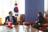 Park Jung-sung, vice trade minister at the Ministry of Trade, Industry and Resources, meets with Alexandra Dostal, senior assistant deputy minister at Canada's Innovation, Science and Economic Development, at the Foreign Ministry reception room at the government complex annex in Jongno District, central Seoul, on Dec. 1. [MINISTRY OF TRADE, INDUSTRY AND RESOURCES]