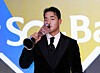 KT Wiz outfielder Ahn Hyun-min kisses his trophy after winning Rookie of the Year at the 2025 Shinhan SOL Bank KBO Awards at Lotte Hotel World in Seoul on Nov. 24. [YONHAP]