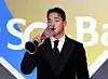 KT Wiz outfielder Ahn Hyun-min kisses his trophy after winning Rookie of the Year at the 2025 Shinhan SOL Bank KBO Awards at Lotte Hotel World in Seoul on Nov. 24. [YONHAP]