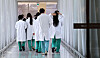 Medical professionals walk in a general hospital in downtown Seoul in March 2024. [NEWS1]