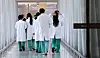 Medical professionals walk in a general hospital in downtown Seoul in March 2024. [NEWS1]