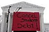 A sign reading ″cancel student debt″ is seen outside the Supreme Court in Washington on June 30, 2023. [AP/YONHAP]