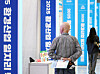 A senior citizen looks at notices at a job fair held on May 27 in southern Seoul. [NEWS1]