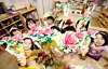 Preschoolers make carnation crafts to gift to their parents in time for Parents' Day in Gwangju on May 8. [NEWS1]
