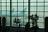 Staff clean the windows of the Incheon International Airport on March 25. [YONHAP]