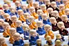Porcelain statues of young monks are displayed at the Seoul International Buddhism Expo. [YONHAP]