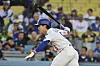 Los Angeles Dodgers' Kim Hye-seong follows through on an infield single in the second inning of a baseball game against the Oakland Athletics on May 14, in Los Angeles. [AP/YONHAP]