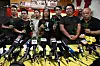 Members of the League of Social Democrats hold up roses at a press conference at their headquarters in Hong Kong on June 29. Hong Kong's League of Social Democrats, one of the city's last remaining opposition parties said it will disband after a five-year political crackdown by Beijing, a year ahead of its 20th anniversary. [AFP/YONHAP]