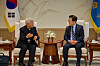 President Lee Jae Myung, right, meets with Cardinal Lazarus You Heung-sik at the presidential office in central Seoul on July 7. [JOINT PRESS CORPS]
