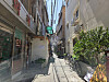 Sprinklers spray water on a street near a jjokbang (tiny subdivided room) village in Jongno District, central Seoul [SHIN HYE-YEON]
