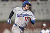 Los Angeles Dodgers designated hitter Shohei Ohtani runs between second and third base on his way to score a run against the Atlanta Braves during the fourth inning at Truist Park on May 4. [REUTERS/YONHAP]