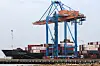A container is loaded onto a cargo ship while docked at Hai Phong port in Hai Phong, Vietnam, on April 16. [REUTERS/YONHAP]