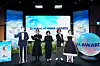 Producers of the 2024 MAMA Awards pose for photos alongside pictures of hosts Park Bo-gum and Kim Tae-ri prior to a press briefing held on Oct. 29 at the CJ ENM headquarters building in western Seoul. [CJ ENM]