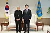 President Lee Jae Myung, right, poses for a photo with Cardinal Lazarus You Heung-sik at the presidential office in central Seoul on July 7. [YONHAP]