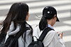 Students walk across a street near a middle school in Seoul on Nov. 4, 2024. [YONHAP]