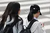 Students walk across a street near a middle school in Seoul on Nov. 4, 2024. [YONHAP]
