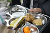 Students receive lunch at a school cafeteria in Jeju on Dec. 5, 2024. [NEWS1]