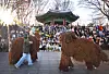 Participants of the 2025 Seoul Eco Hiking Festa watch a performance at Namsan Palgakjeong Pavilion during their hike along a trail on Mount Namsan in Jung District, central Seoul, on Nov. 15.[PARK SANG-MOON]