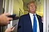 U.S. President Donald Trump speaks with reporters while flying aboard Air Force One en route from Calgary, Canada, on June 16. [AP/YONHAP]