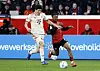 Bayern Munich defender Kim Min-jae, left, vies for the ball during a Bundesliga match against Bayer 04 Leverkusen at BayArena in Germany on Feb. 15. [REUTERS/YONHAP]