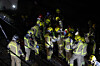 Generalitat's firemen work at the place where a train crashed with a collapsed wall which fell to the via at Gelida city in Barcelona, Spain, on Jan. 20. [EPA/YONHAP]